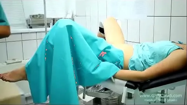HD beautiful girl on a gynecological chair (33 power Clips